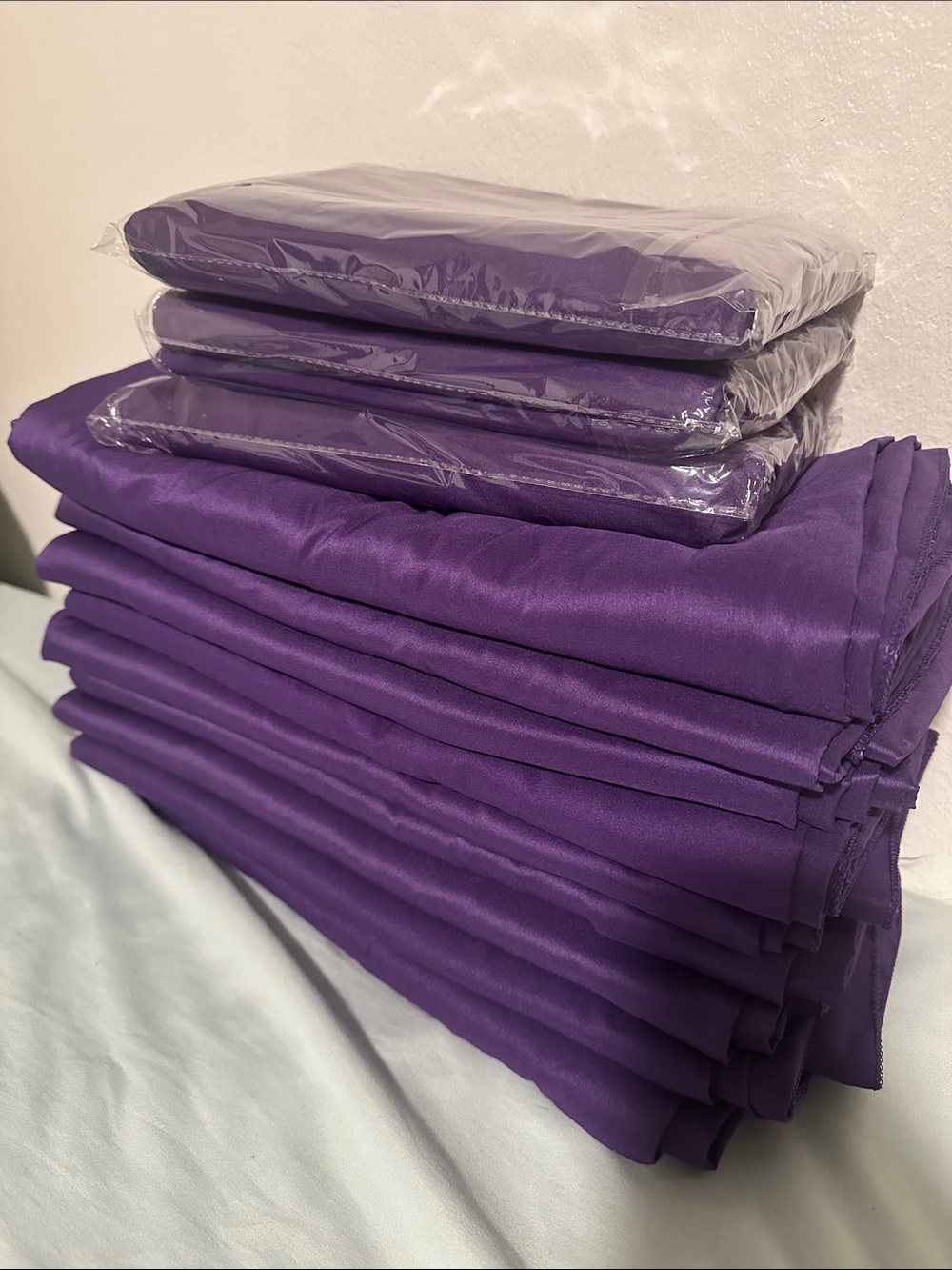 12 purple table cloths ( 60”x 126”)